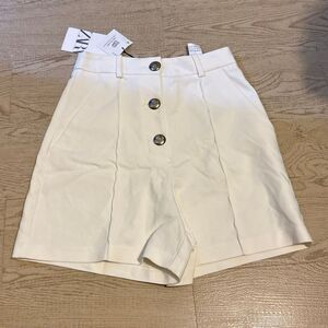 (NWT) Zara high-waisted white shorts size Xs  with button closure, made from a c